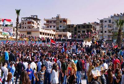 Photo of Suriye’nin Humus kentindeki üniversite öğrencileri yönetime destek gösterisi yaptı
